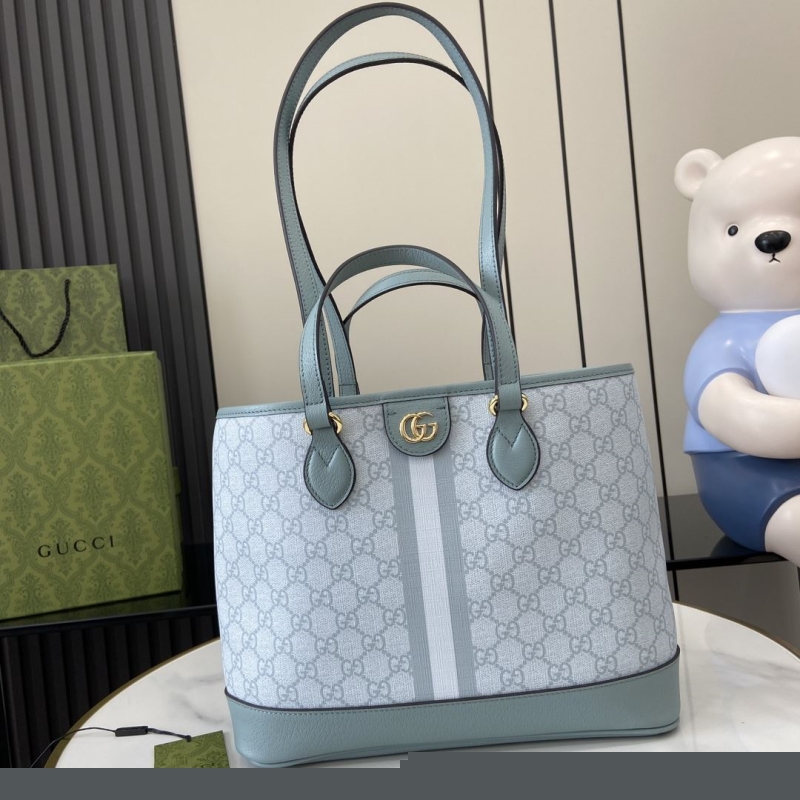 G*u*i shopping bags